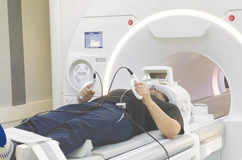 Justin Fernandez in MRI machine